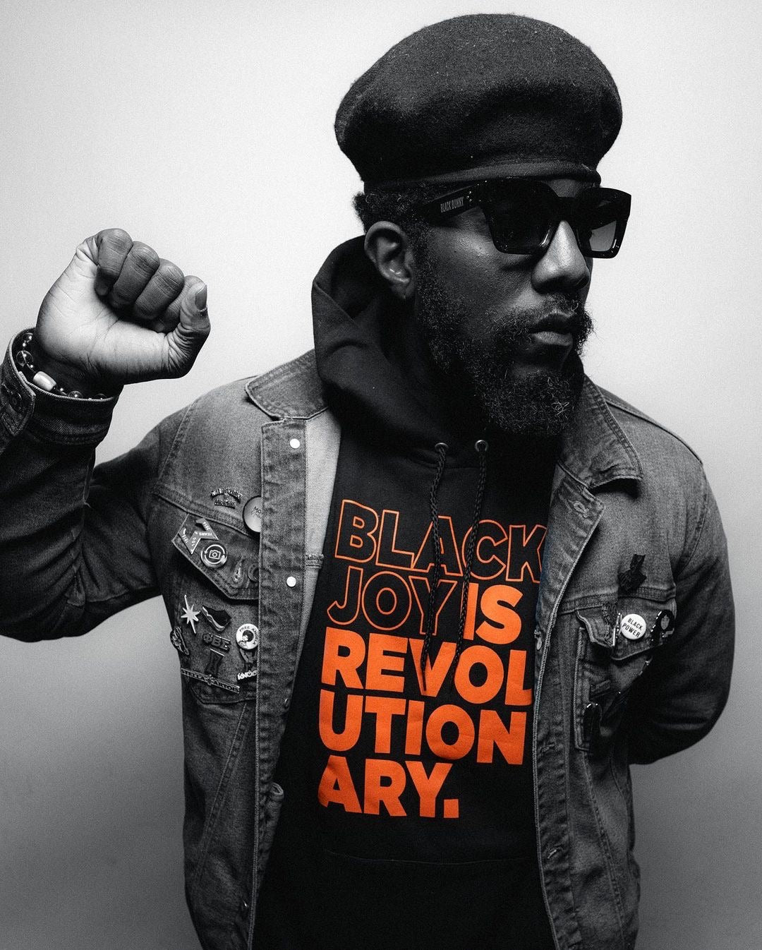 Black Joy Is Revolutionary (Hoodie) (Art Hype Orange & Black)